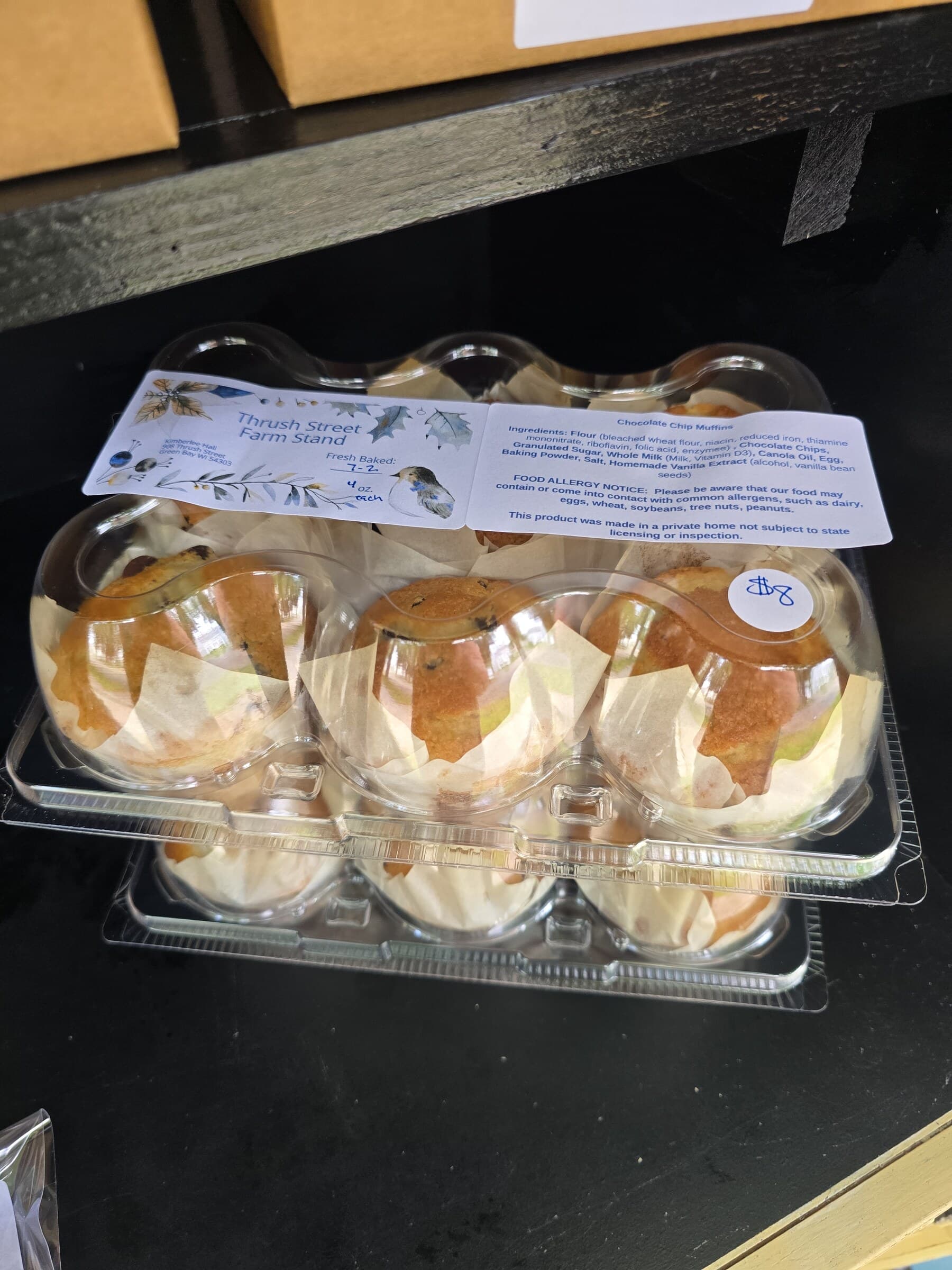A package of freshly baked sweet rolls labeled and ready for the farm stand.